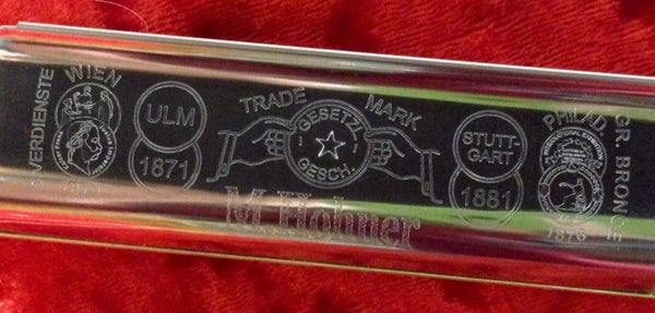 Lower cover plate has five pointed star added as a tribute to the six pointed star that was on the pre- war marine band harmonica.